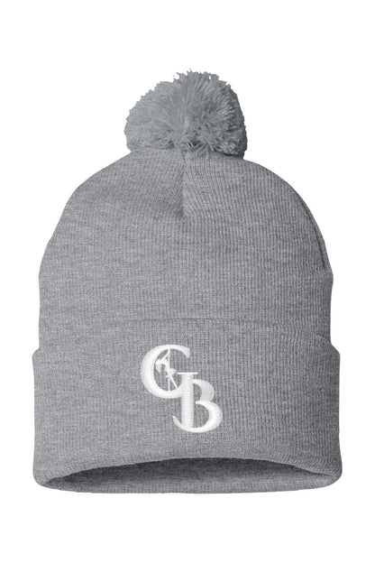Grey knit beanie with a pom-pom top and white embroidered GB logo on the folded cuff.