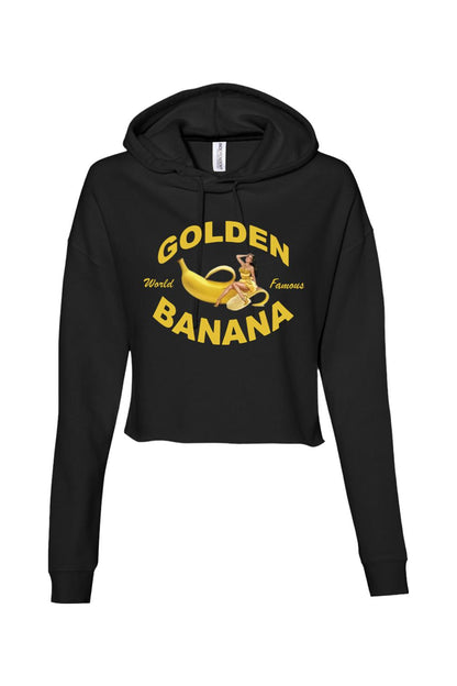 Black cropped hooded sweatshirt featuring a Golden Banana graphic with a pin-up girl illustration and yellow text.
