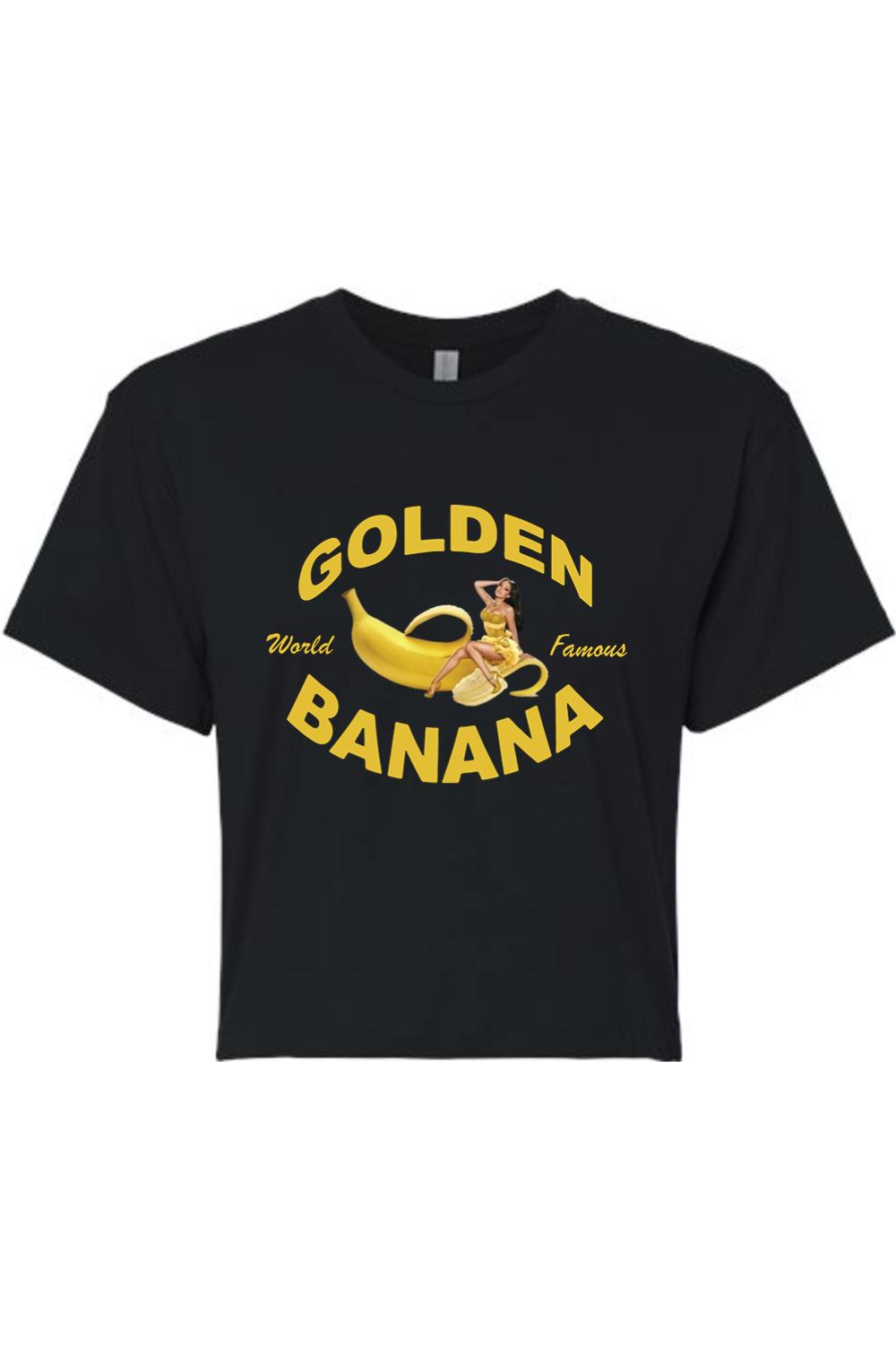 Black cotton cropped tee featuring a Golden Banana graphic with a pin-up girl illustration and yellow text.