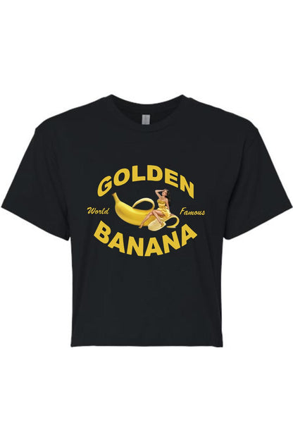 Black cotton cropped tee featuring a Golden Banana graphic with a pin-up girl illustration and yellow text.