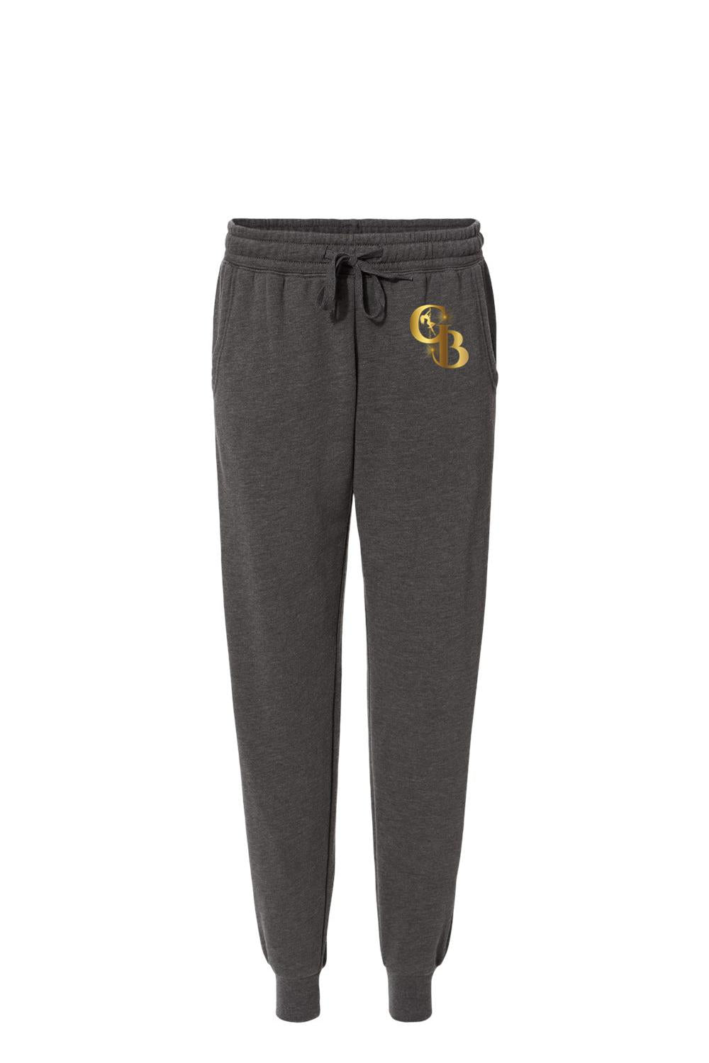 Charcoal grey fleece sweatpants with a drawstring waist and a metallic gold Golden Banana logo on the hip.