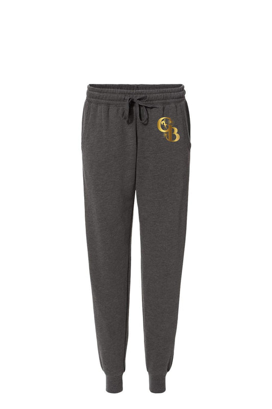 Charcoal grey fleece sweatpants with a drawstring waist and a metallic gold Golden Banana logo on the hip.