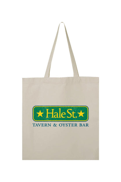Beige canvas tote bag featuring a green Hale St. Tavern & Oyster Bar logo with yellow stars.