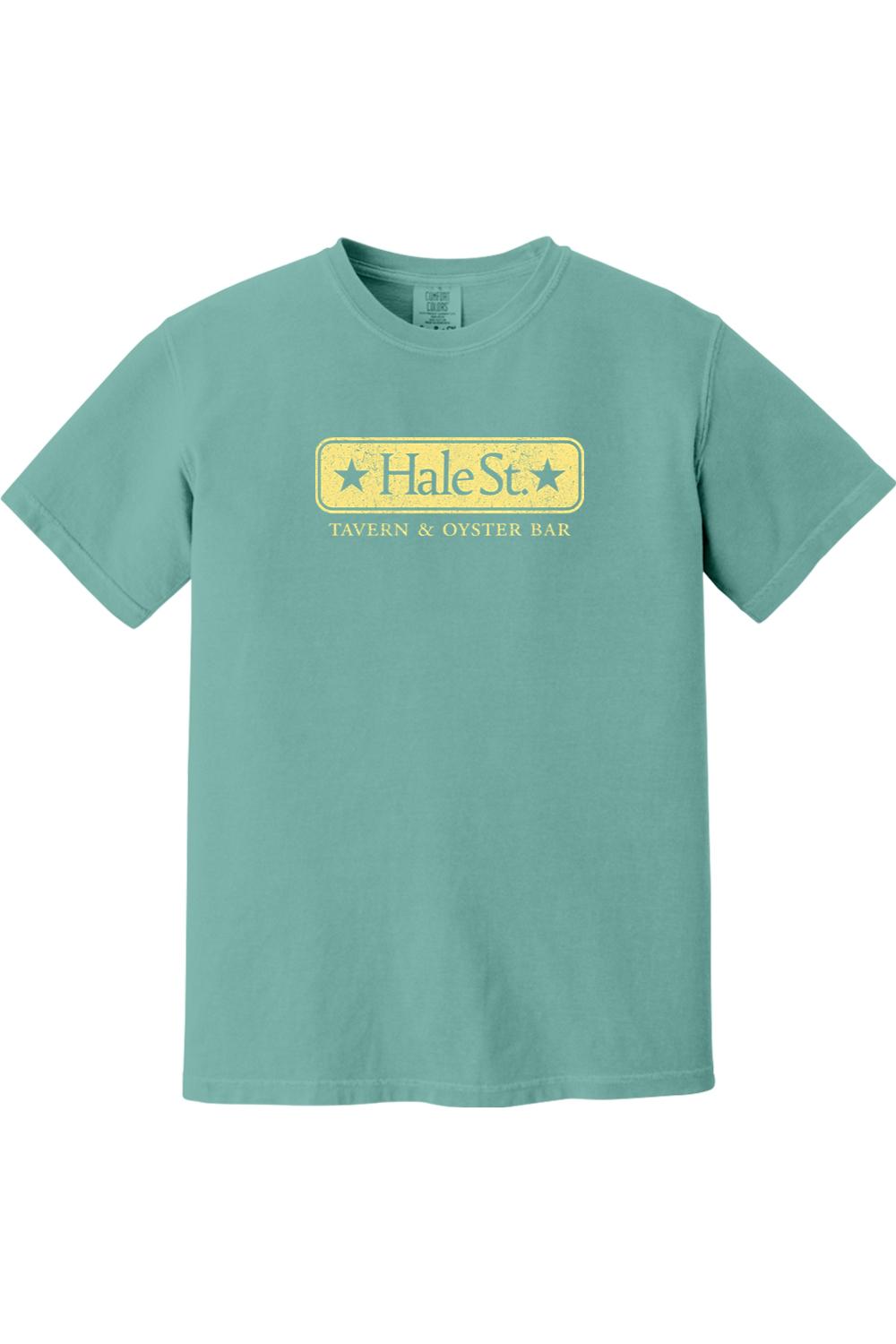 Teal Comfort Colors crewneck t-shirt featuring a distressed yellow Hale St. Tavern & Oyster Bar logo on the chest.