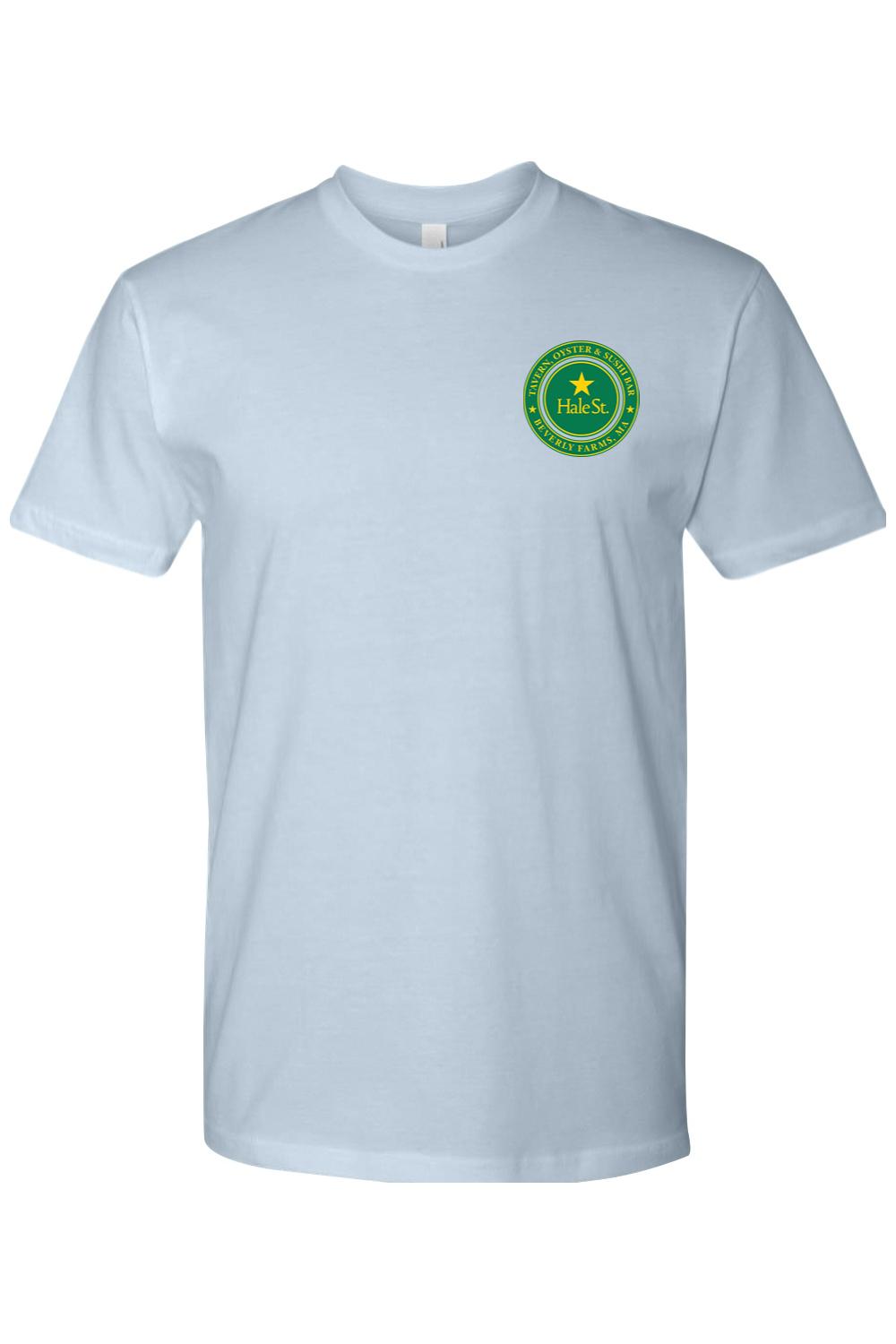 Light blue crew neck t-shirt featuring a circular green Hale St. Tavern logo on the left chest.