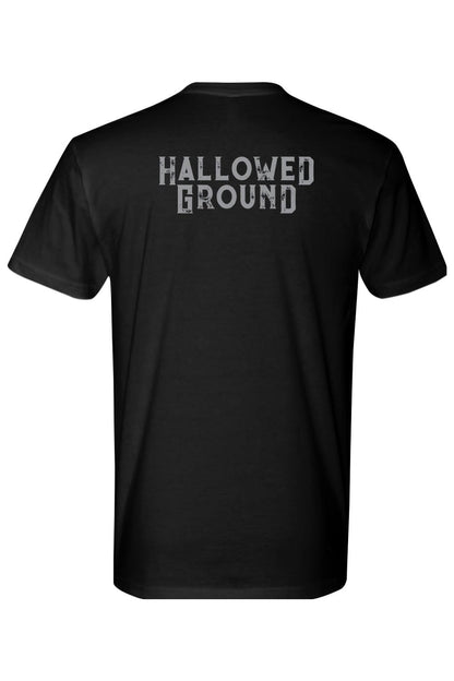 Black 100% cotton t-shirt featuring the Hallowed Ground logo in distressed grey lettering on the back.
