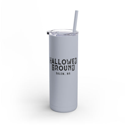 20oz matte grey stainless steel skinny tumbler with Hallowed Ground Salem, MA text and matching straw.