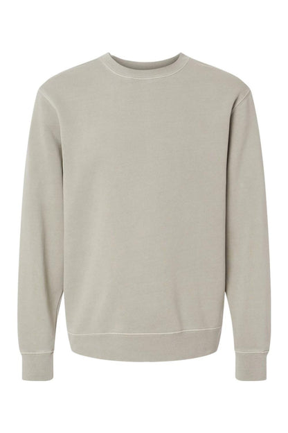 Unisex midweight crewneck sweatshirt in a soft, pigment-dyed light grey with a classic, lived-in aesthetic.
