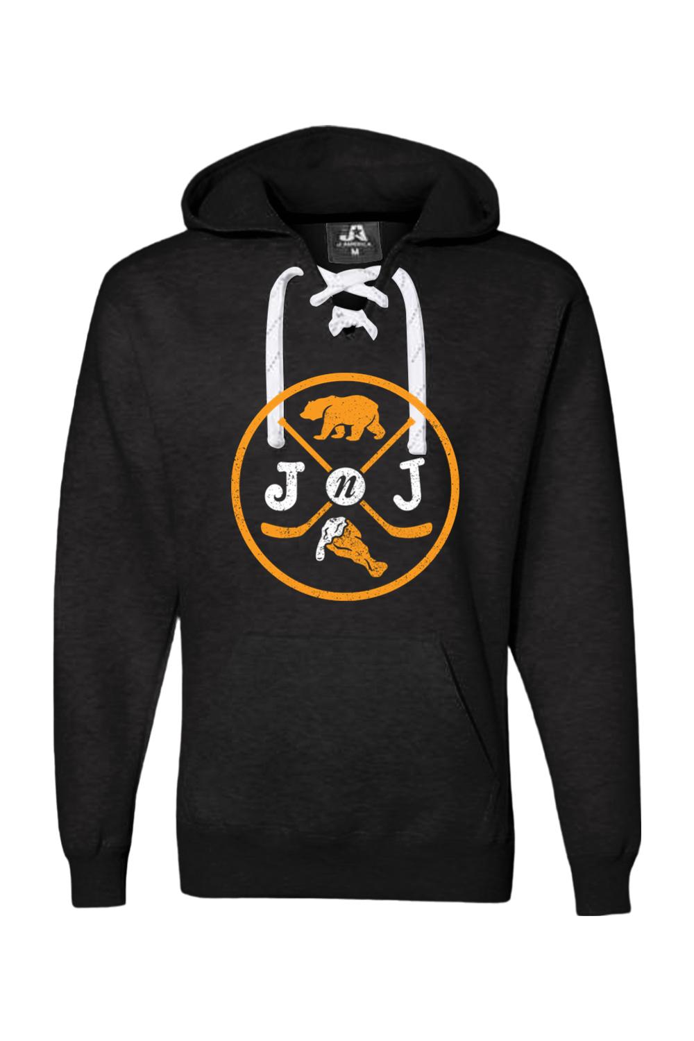 Black hooded sweatshirt with white lace-up neck, featuring a bear and wing logo graphic in orange and white.