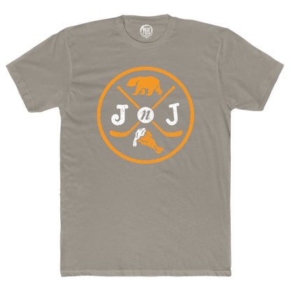 Grey cotton crewneck t-shirt featuring an orange and white Jake n JOES bear, hockey stick, and wing graphic logo.