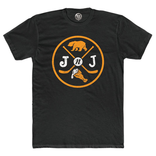 Black cotton crew neck t-shirt featuring a Jake n JOES bear, wing, and hockey stick graphic logo.