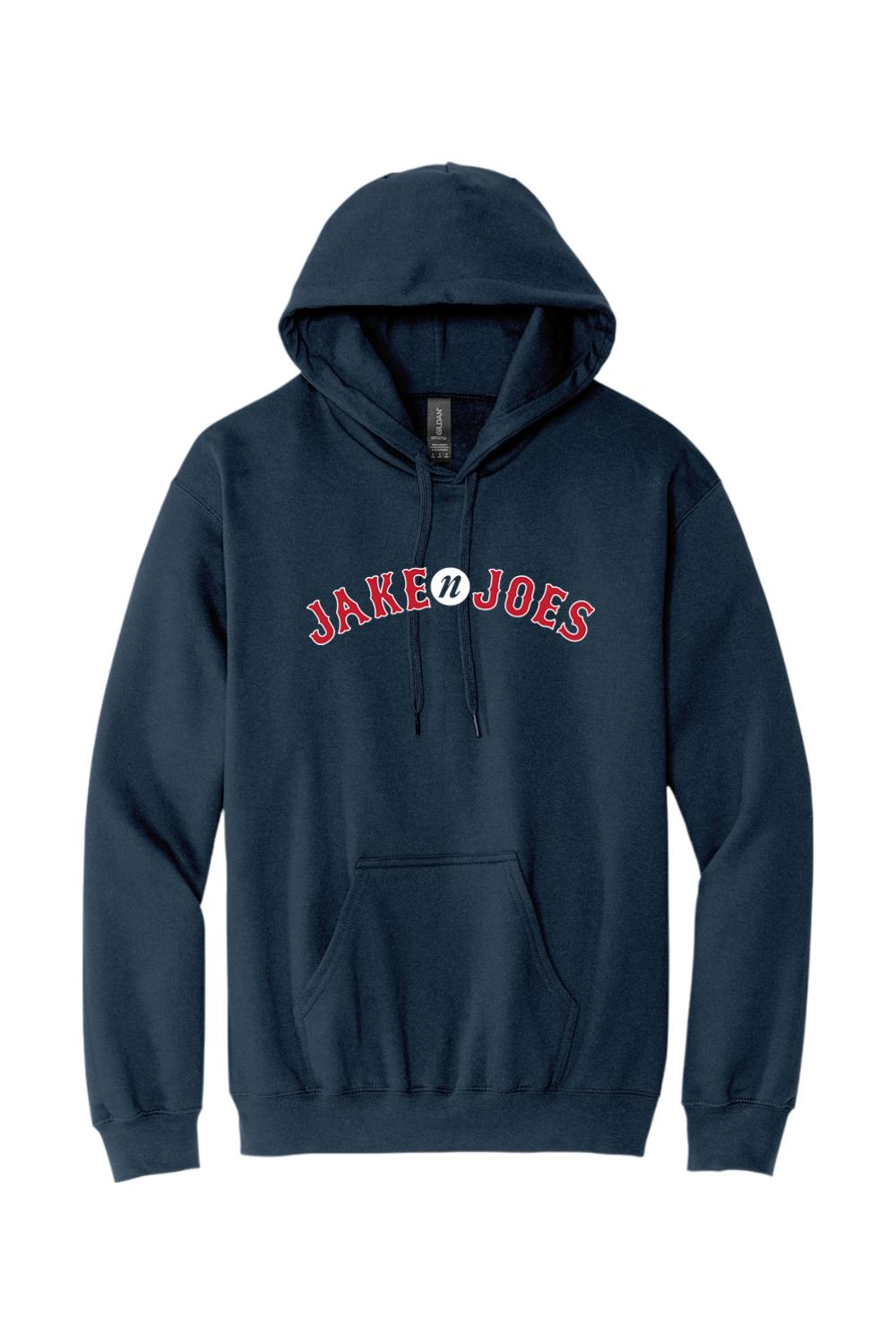Navy blue men's hoodie featuring a red and white Jake n JOES baseball-style logo, drawstring hood, and front pocket.