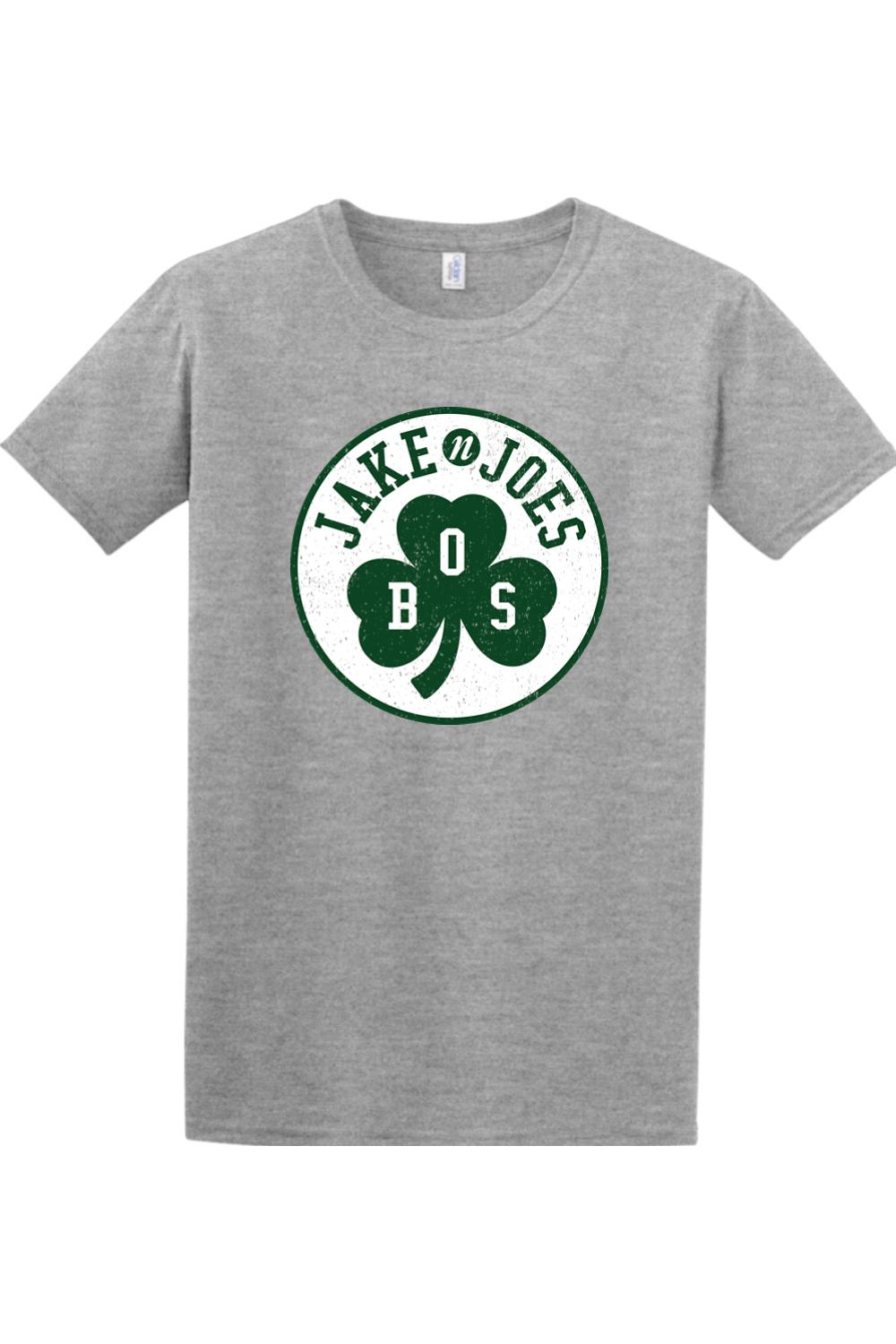 Grey cotton crewneck t-shirt featuring a green Jake n JOES Boston shamrock logo graphic on the chest.