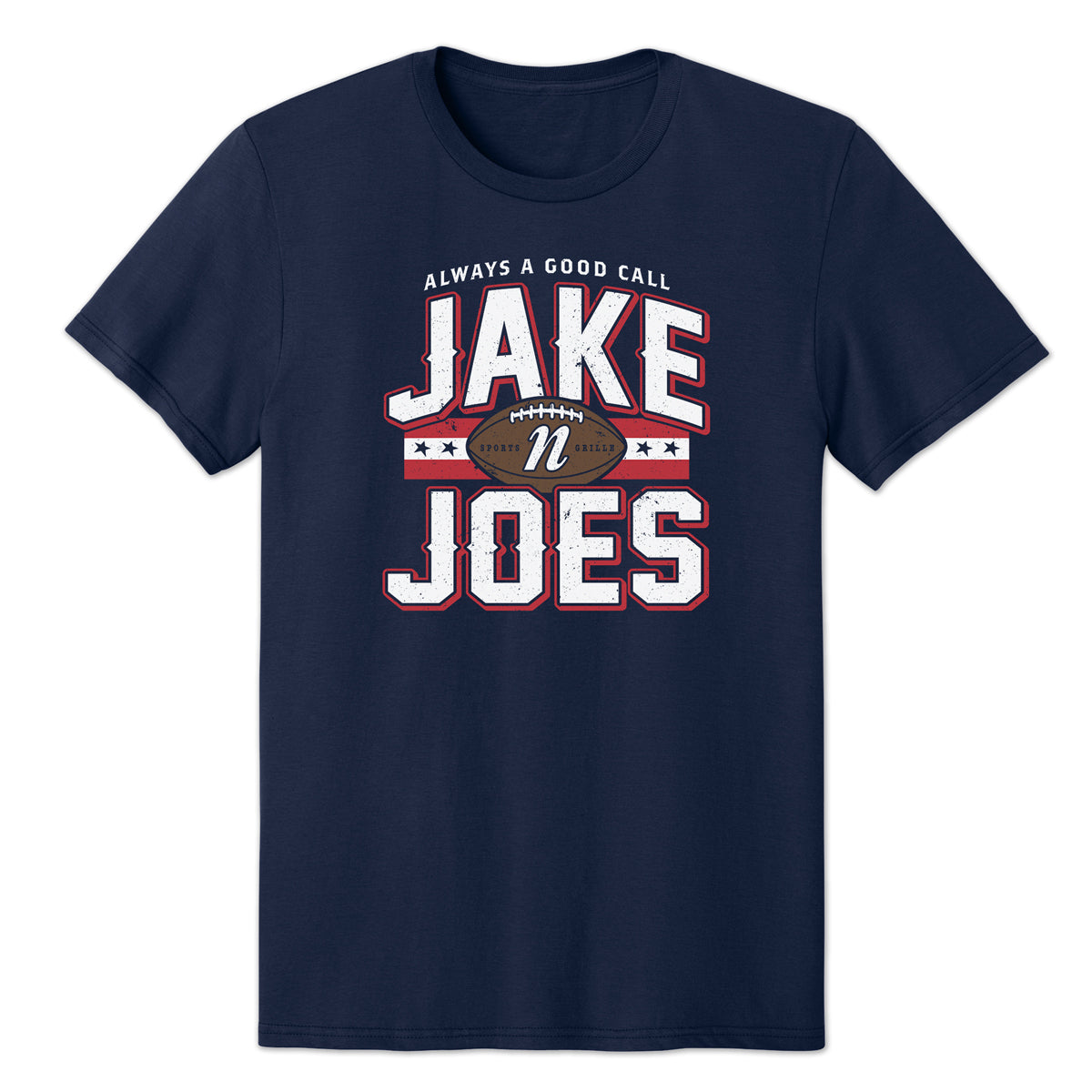 Navy blue 100% cotton t-shirt featuring a distressed Jake n JOES football graphic with red and white accents.