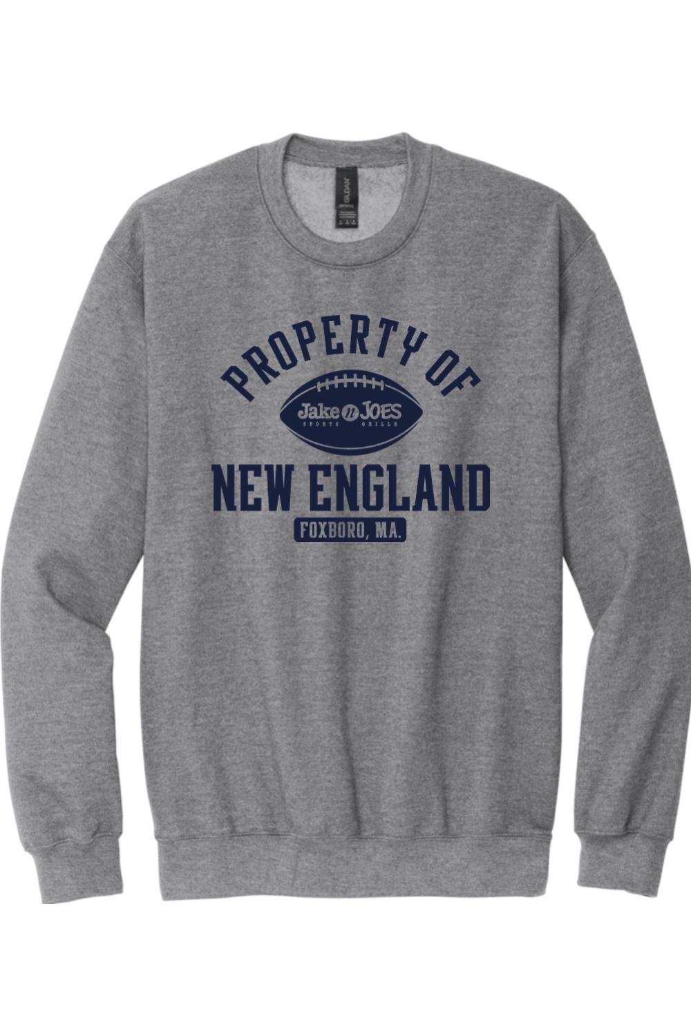 Grey crewneck sweatshirt featuring a navy blue Property of New England football graphic with Jake n JOES branding.