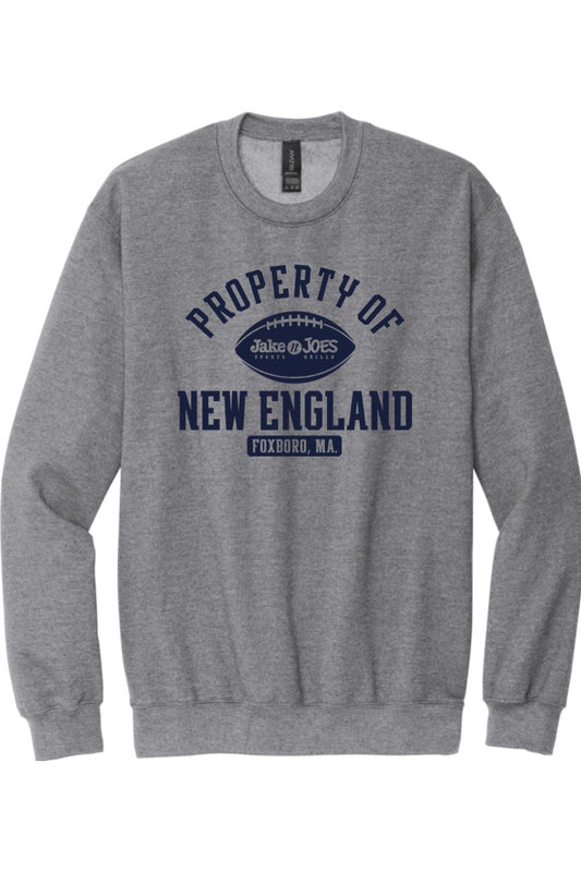 Grey crewneck sweatshirt featuring a navy blue Property of New England football graphic with Jake n JOES branding.