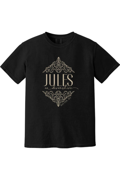 Black Comfort Colors short sleeve shirt featuring a Jules on Devonshire logo with elegant gold floral flourishes.