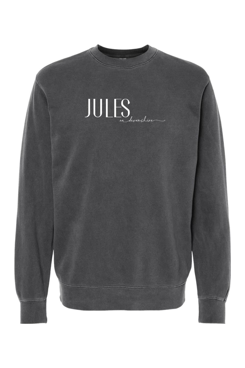 Charcoal grey pigment-dyed crewneck sweatshirt with white Jules on Devonshire logo text on the chest.