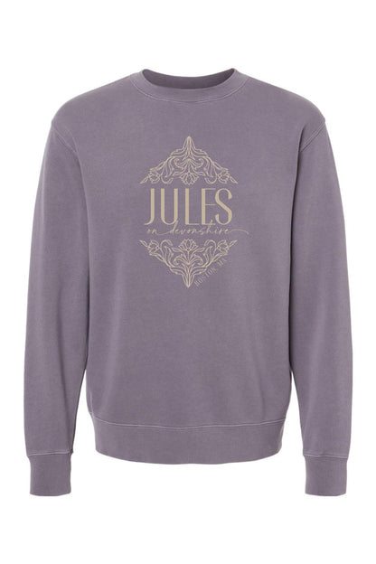 Pigment-dyed purple crewneck sweatshirt featuring a beige Jules on Devonshire Boston, MA floral graphic print.