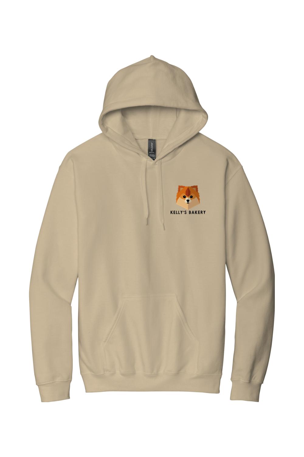 Tan cotton hooded sweatshirt featuring a small Kelly's Bakery logo with a stylized dog graphic on the left chest.