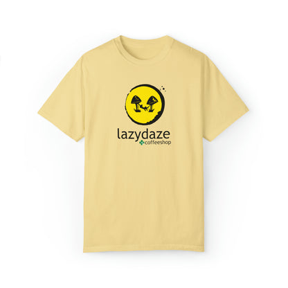 Light yellow relaxed-fit cotton t-shirt featuring a black and yellow Lazy Daze coffeeshop mushroom logo.