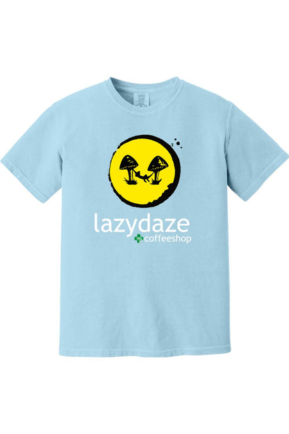 Light blue cotton t-shirt featuring a yellow circle graphic with a person in a hammock between two mushrooms.