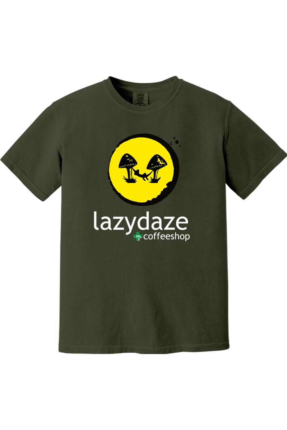 Olive green cotton t-shirt featuring a yellow circle graphic with a hammock between mushrooms and Lazy Daze text.