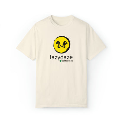 Relaxed fit, cream-colored cotton t-shirt featuring a yellow circle logo with black mushrooms and Lazy Daze text.