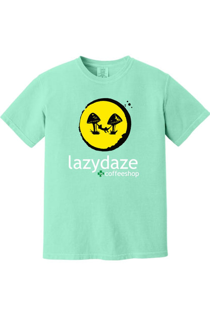 Mint green soft cotton t-shirt featuring a yellow circle graphic with a mushroom hammock design and Lazy Daze logo.