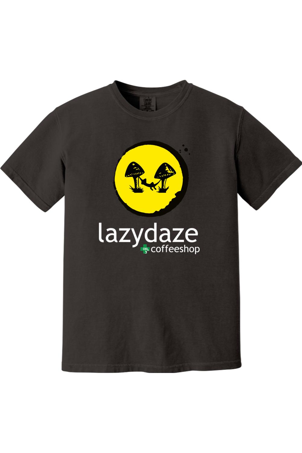 Black cotton crew neck t-shirt featuring a yellow circle graphic with mushrooms and Lazy Daze Coffeeshop branding.