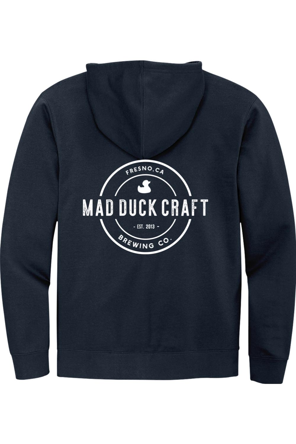 Navy blue full-zip hoodie featuring a white Mad Duck Craft Brewing Co. logo printed on the back.