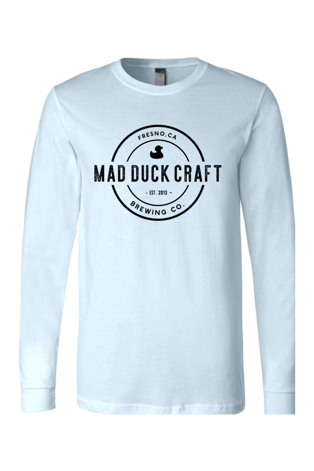 Light blue long sleeve jersey tee featuring a black Mad Duck Craft Brewing Co. circular logo on the chest.