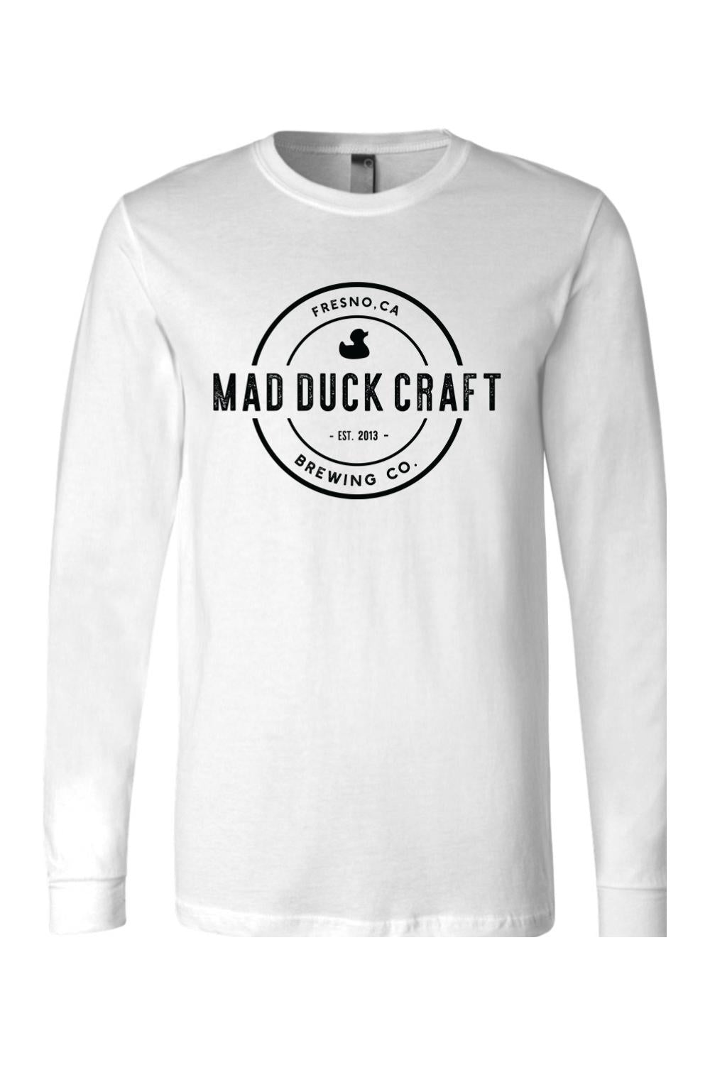 White long-sleeve cotton jersey tee featuring a black Mad Duck Craft Brewing Co. logo on the chest.