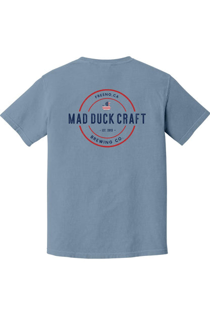 Blue Comfort Colors short sleeve cotton shirt featuring a red, white, and blue Mad Duck Craft Brewing Co. back logo.