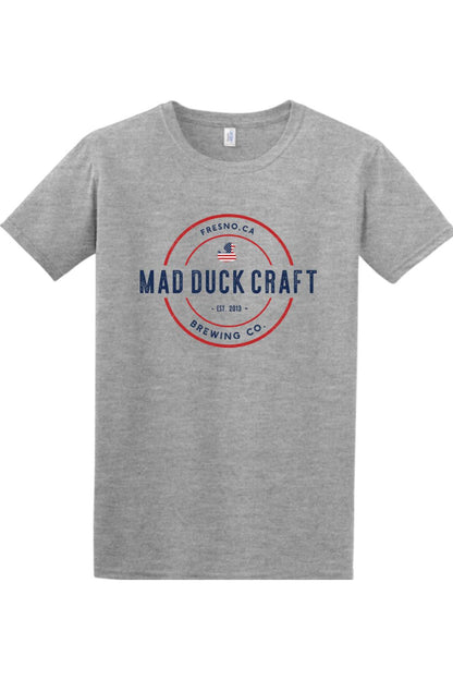Heather gray crewneck t-shirt featuring a red, white, and blue Mad Duck Craft Brewing logo on the chest.