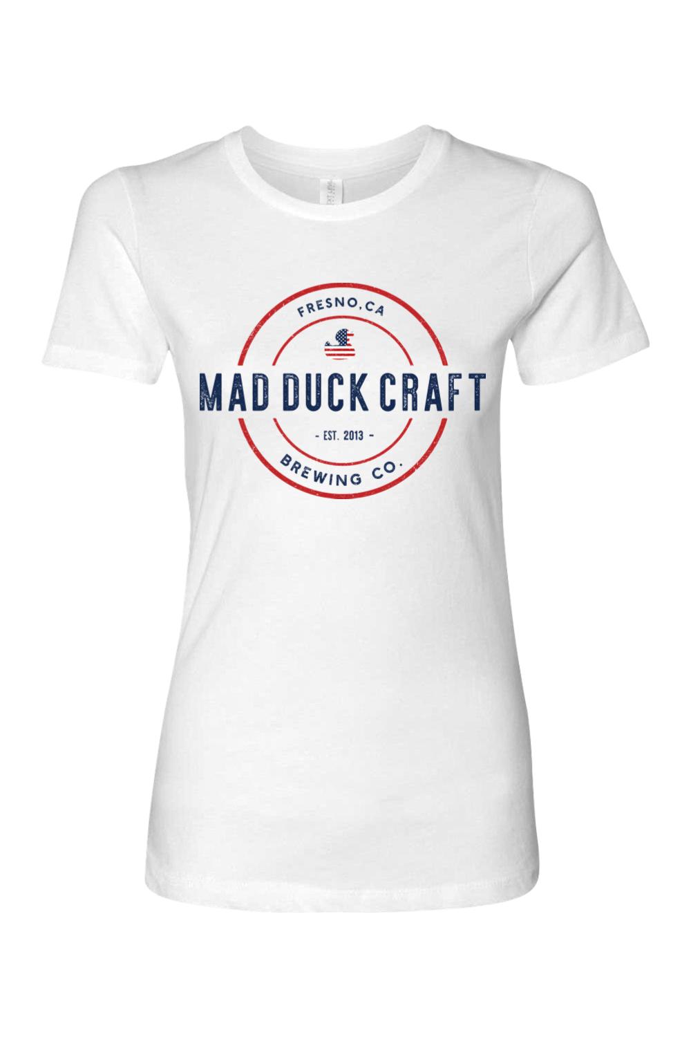 White women's cotton t-shirt featuring a red, white, and blue Mad Duck Craft Brewing Co. logo on the chest.