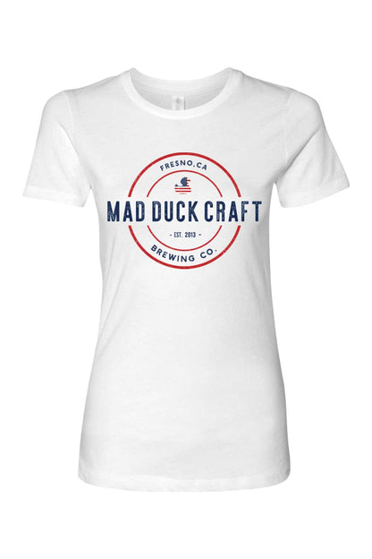 White women's cotton t-shirt featuring a red, white, and blue Mad Duck Craft Brewing Co. logo on the chest.