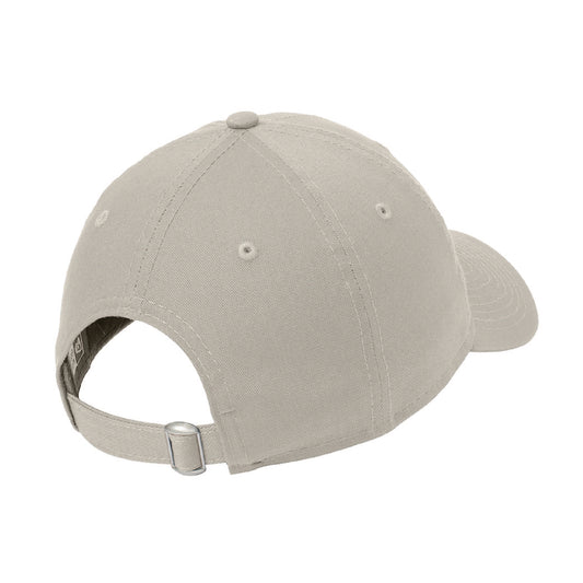 Beige unstructured cotton dad cap with an adjustable fabric strap and silver D-clip closure.