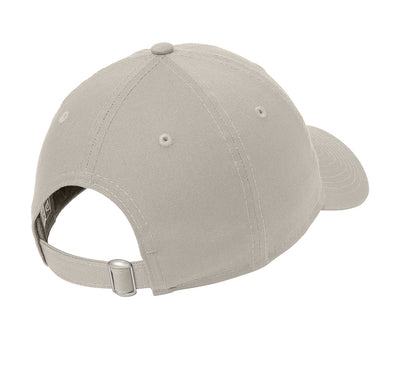 Beige unstructured cotton dad cap with an adjustable fabric strap and silver D-clip closure.