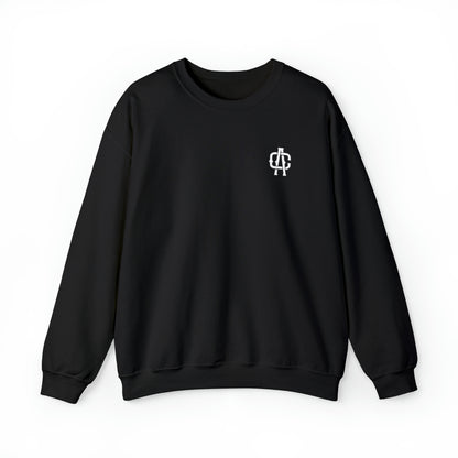 Black heavy blend crewneck sweatshirt with a white AC logo on the chest, featuring a ribbed knit collar and loose fit.