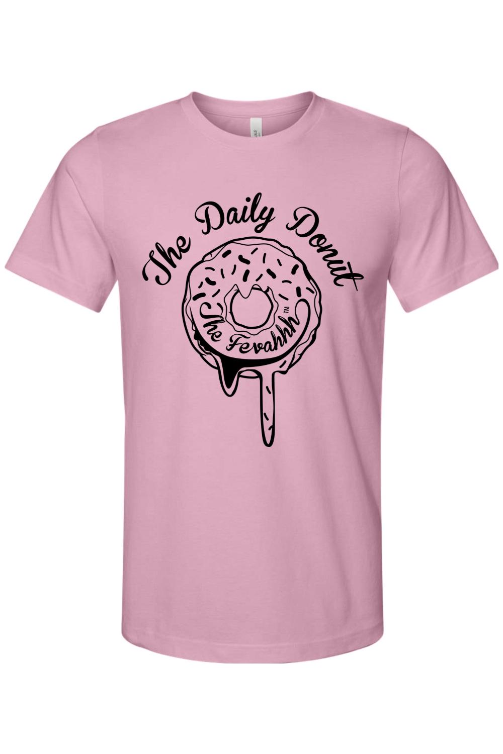 Light pink cotton unisex t-shirt featuring a black graphic of a dripping donut with The Daily Donut text.