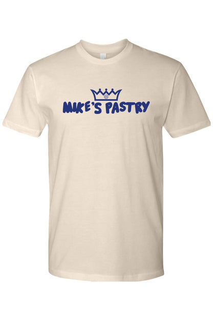 Cream-colored 100% cotton men's t-shirt featuring the blue Mike's Pastry logo and crown graphic on the chest.
