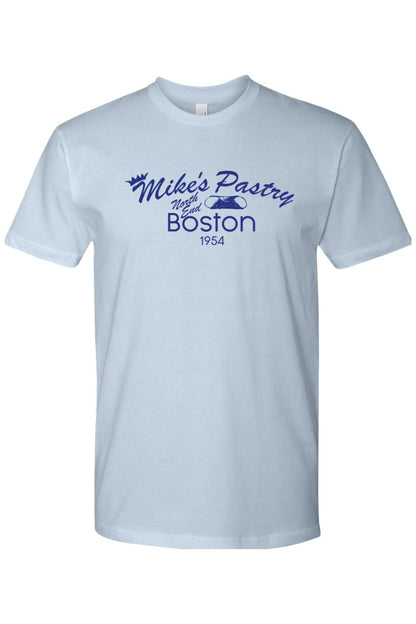 Light blue unisex cotton t-shirt featuring a retro Mike's Pastry Boston logo with a cannoli graphic.