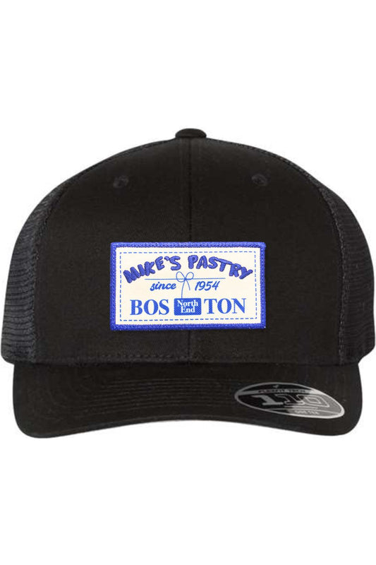Black Mike's Pastry Flexfit 110 mesh-back cap with a blue and white rectangular logo patch on the front.