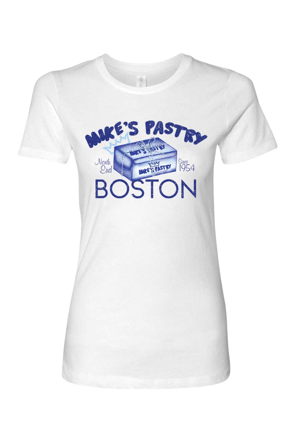 White women's 100% cotton t-shirt featuring a blue Mike's Pastry Boston graphic with a pastry box illustration.