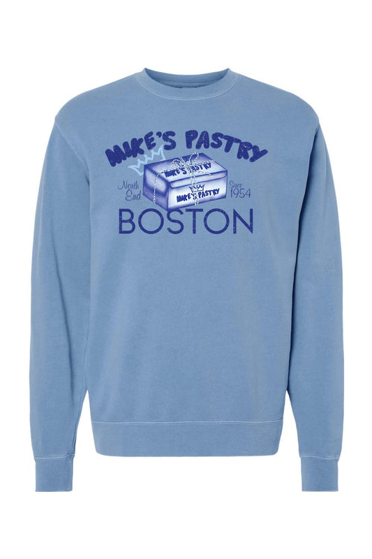Blue pigment-dyed crewneck sweatshirt featuring a vintage Mike's Pastry Boston box graphic on the chest.