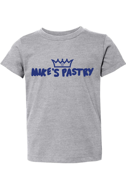Grey toddler t-shirt featuring a blue Mike's Pastry crown logo and text on the chest, made of soft cotton.