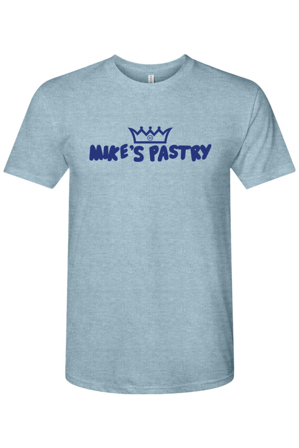 Light blue heathered triblend crewneck t-shirt featuring the navy blue Mike's Pastry logo and crown graphic.