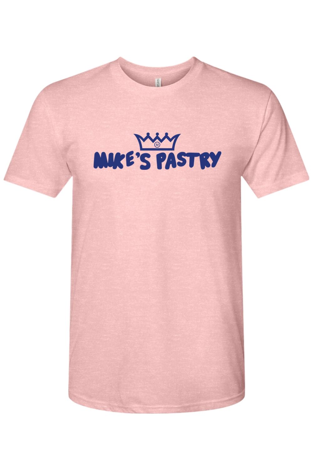 Soft pink triblend men's t-shirt featuring a blue Mike's Pastry logo with a crown icon on the chest.