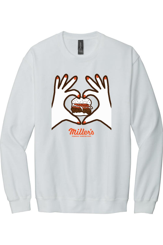 White crewneck sweatshirt featuring a graphic of hands forming a heart around a sandwich with Miller's branding.
